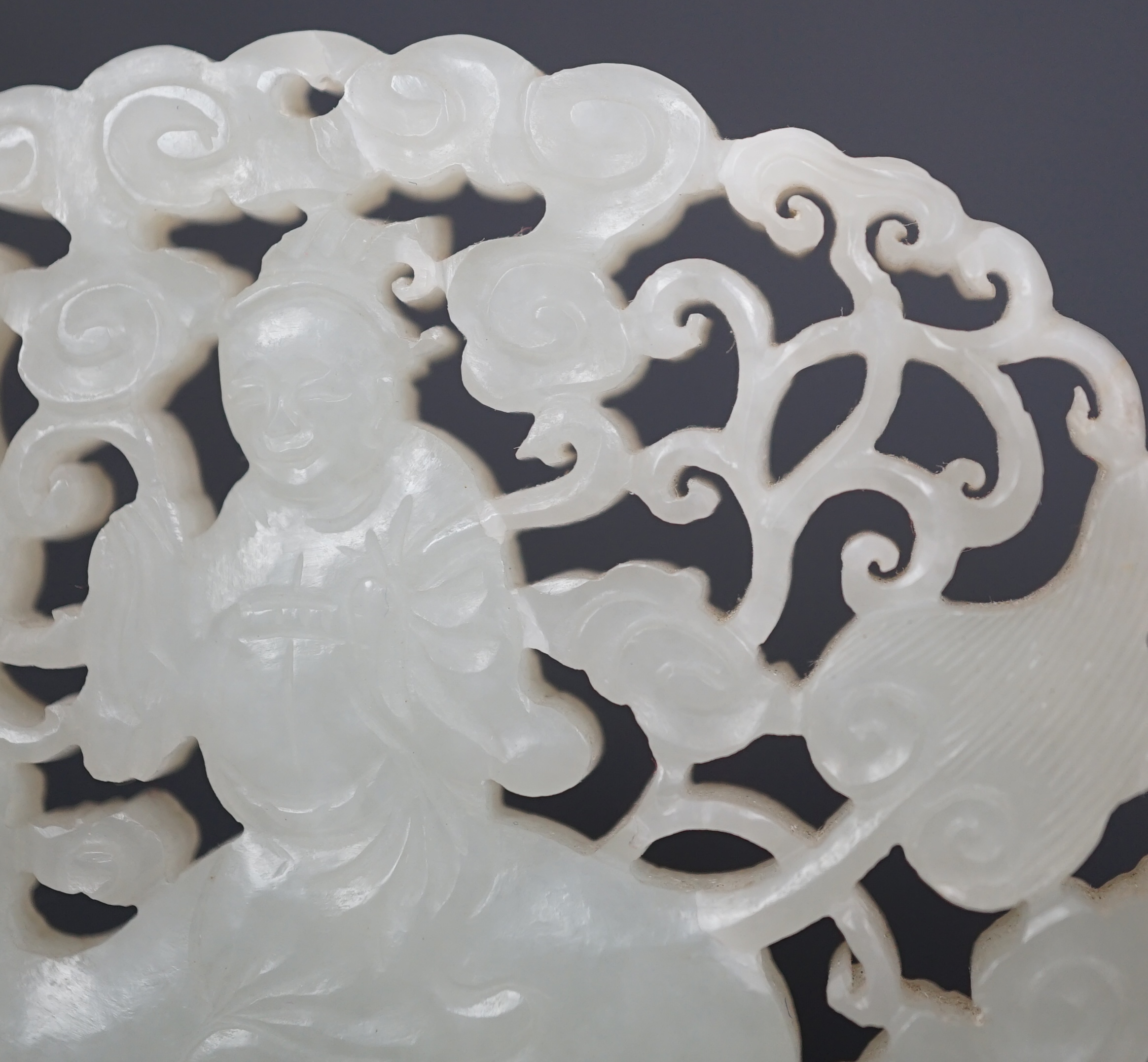 A Chinese white jade ‘qilin and rider’ plaque, 18th/19th century